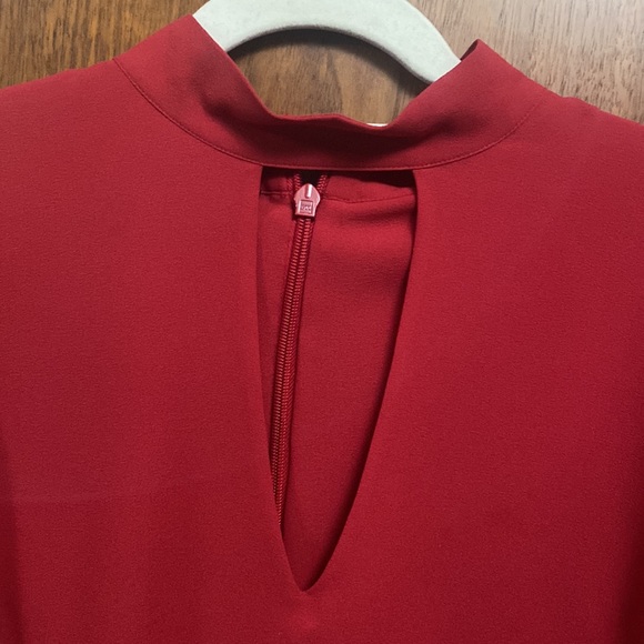 Cranberry color blouse with front keyhole and zip up back. - Picture 2 of 5